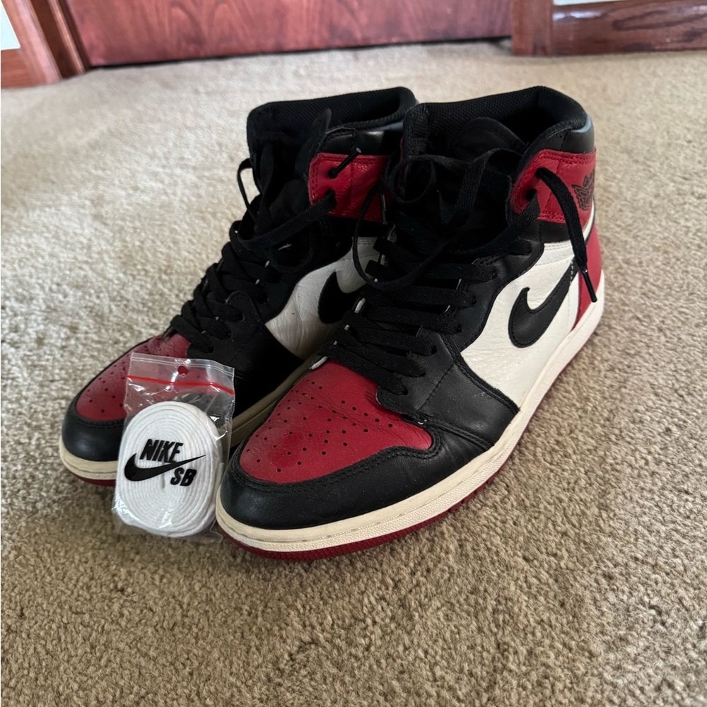 Nike Air Jordan 1s Bred Toe